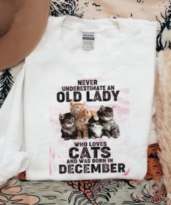Never underestimate an old lady who loves cats and was born in december shirt